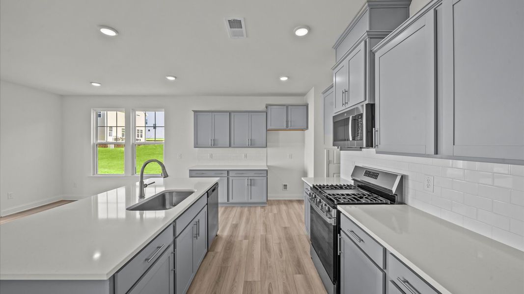 Representative furnished interior of a home built from the Jasmine by DRB Homes in Essex Village, Franklinton (Image 12).