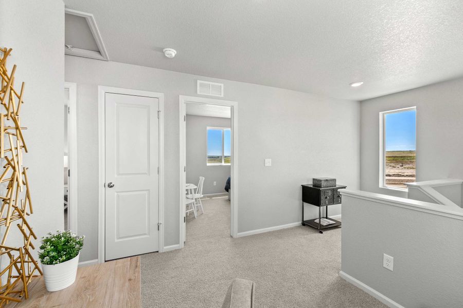Furnished interior view inside a new home in Banning Lewis Ranch - New Homes Colorado Springs, Colorado Springs (Image 19). Furnished interior view inside a new home in Banning Lewis Ranch - New Homes Colorado Springs, Colorado Springs (Image 19).