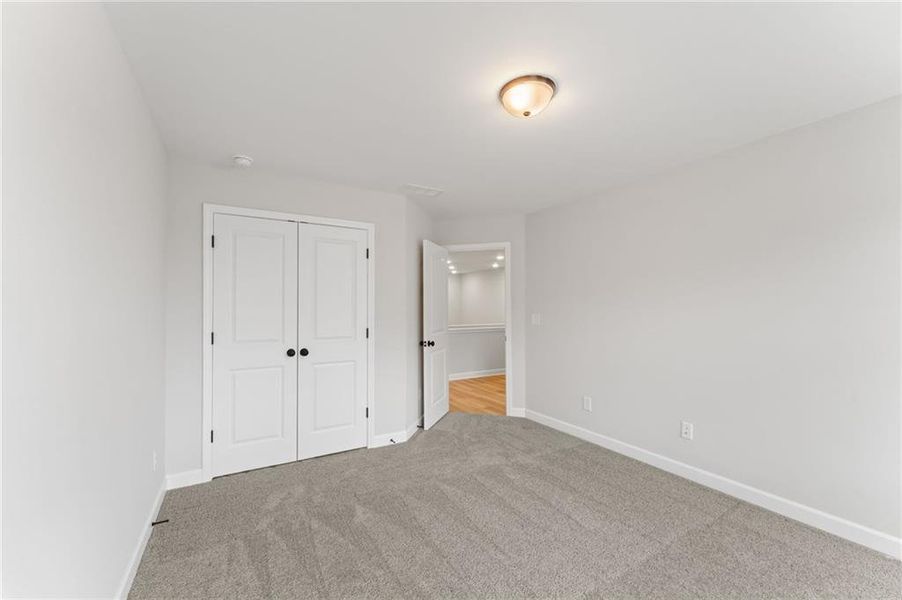 Spacious, unfurnished interior of a new home in Bluffs at Bells Ferry, Marietta (Image 26).