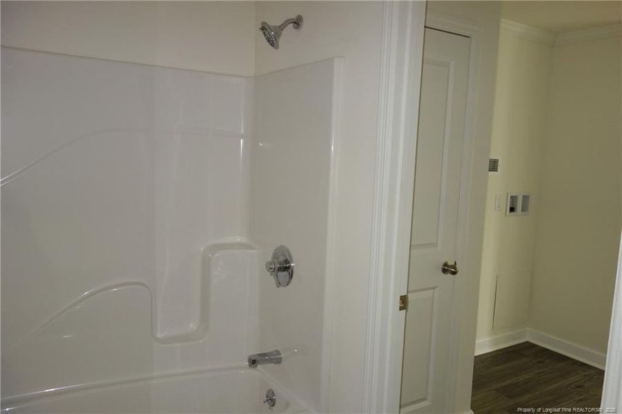 Hall Bath and entrance to Laundry room