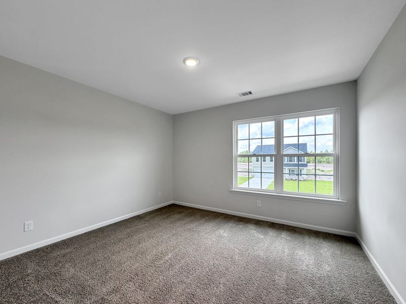 Spacious, unfurnished interior of a new home in Doctor's Creek, Ludowici (Image 16).