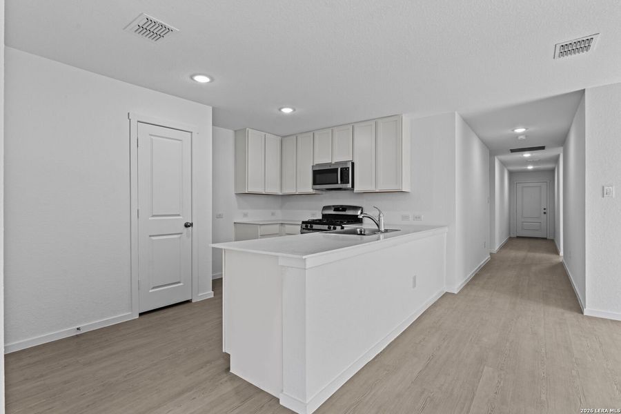 Furnished interior view inside a new home in Friendship Oaks, Fredericksburg (Image 5). Furnished interior view inside a new home in Friendship Oaks, Fredericksburg (Image 5).