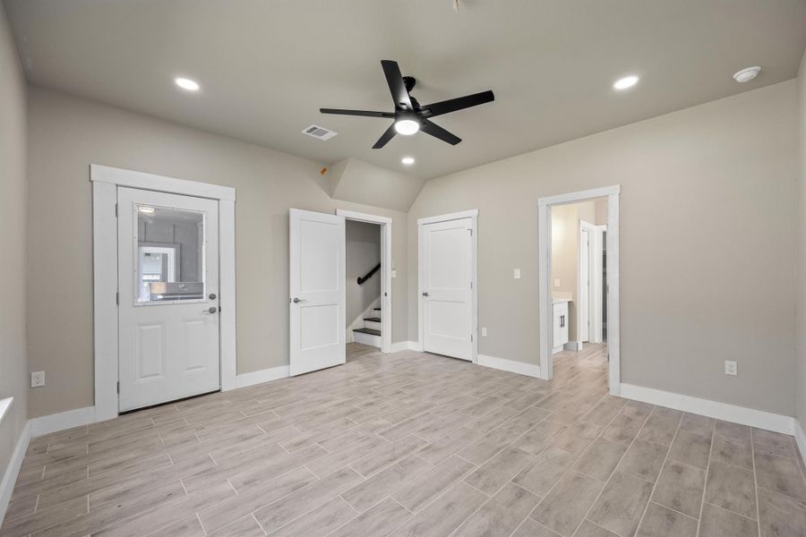 Unfurnished bedroom featuring visible vents, baseboards, recessed lighting, and light wood finished floors Unfurnished bedroom featuring visible vents, baseboards, recessed lighting, and light wood finished floors