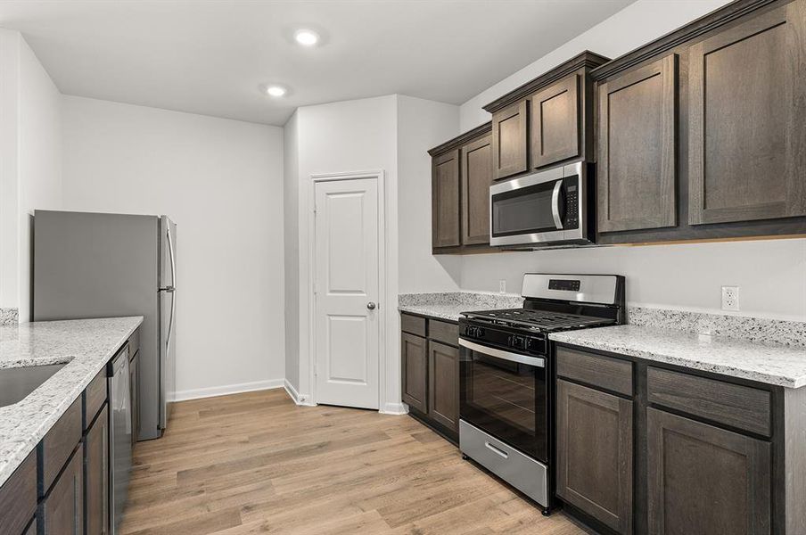 Interior finishes may vary from those shown in photos