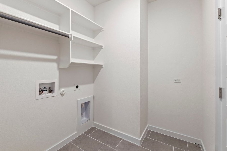 Utility Room in the Pearl home plan by Trophy Signature Homes – REPRESENTATIVE PHOTO