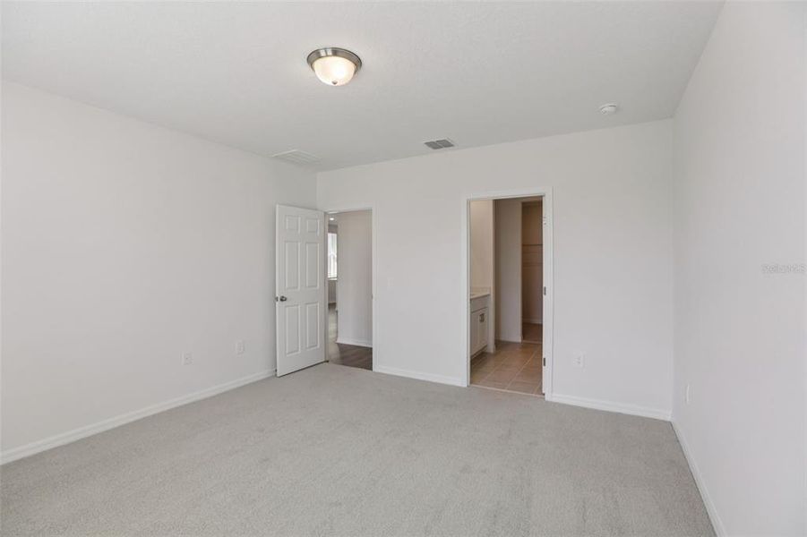 Spacious, unfurnished interior of a new home in Springs at Lake Alfred - Classic Series, Lake Alfred (Image 47).