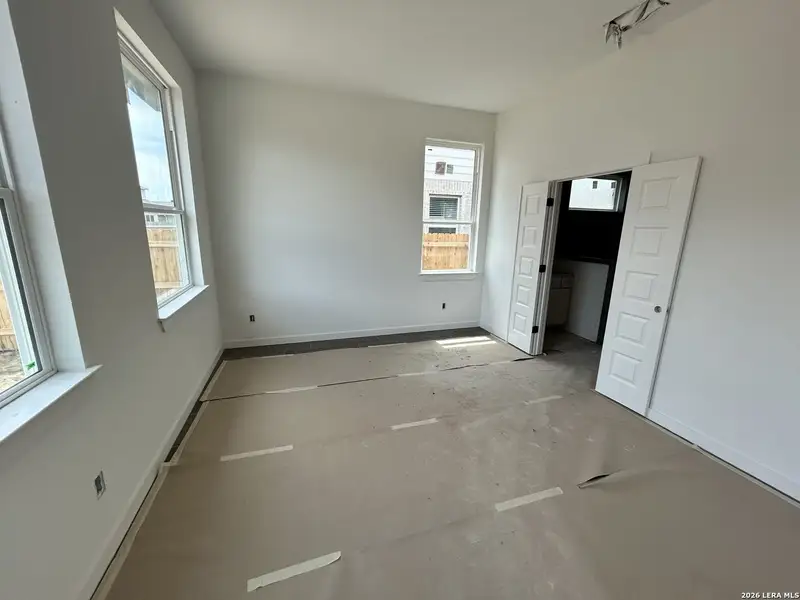In-progress construction of a new home in Legacy at Lake Dunlap, New Braunfels, TX (Image 21).