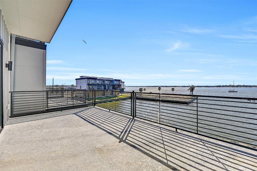 Exterior details and patio area of a home in Lago Pointe, Seabrook (Image 24).