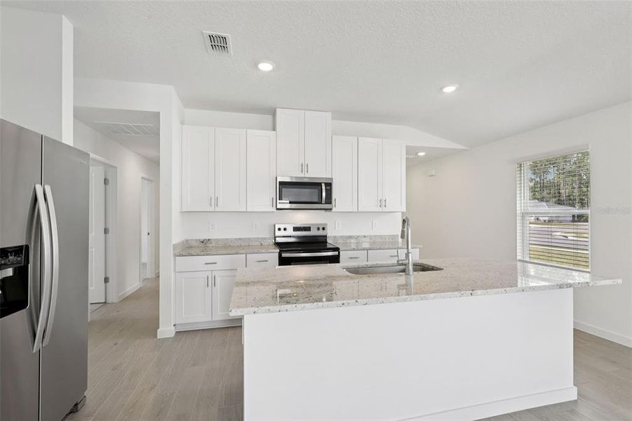 Furnished interior view inside a new home in , Palm Coast (Image 7). Furnished interior view inside a new home in , Palm Coast (Image 7).