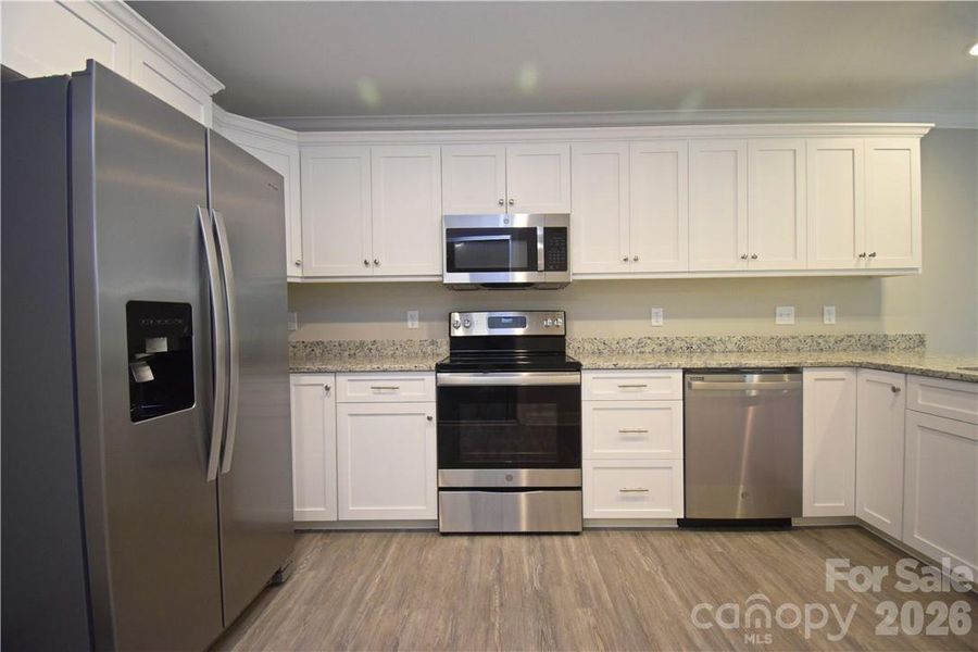 Furnished interior view inside a new home in , Hickory (Image 9).