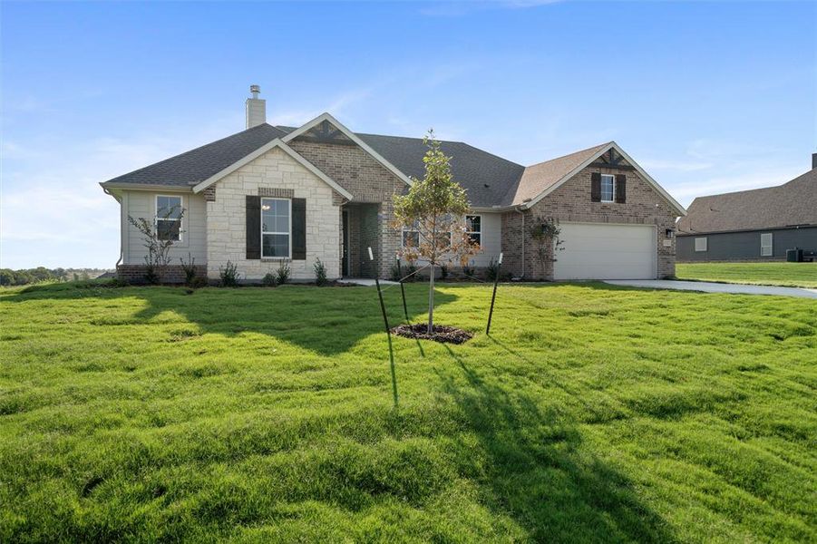 Front exterior of a new home in Fairview Meadows, New Fairview, TX, highlighting curb appeal (Image 15). Front exterior of a new home in Fairview Meadows, New Fairview, TX, highlighting curb appeal (Image 15).