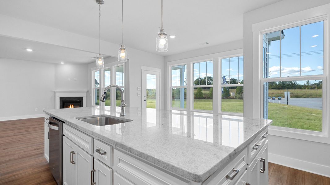 2 story single family home, all white, kitchen