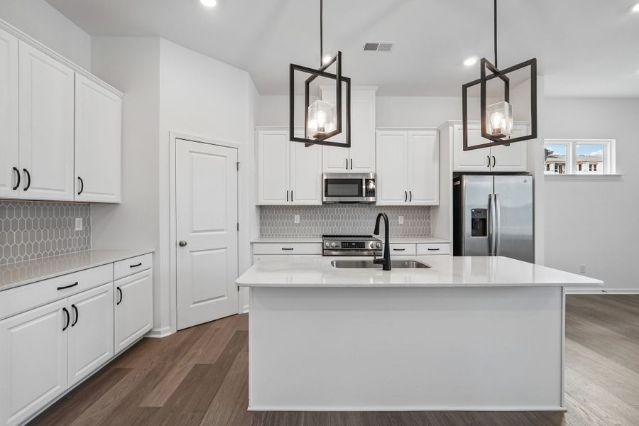 Furnished interior view inside a new home in Terraces at the Exchange, Indian Land (Image 5).