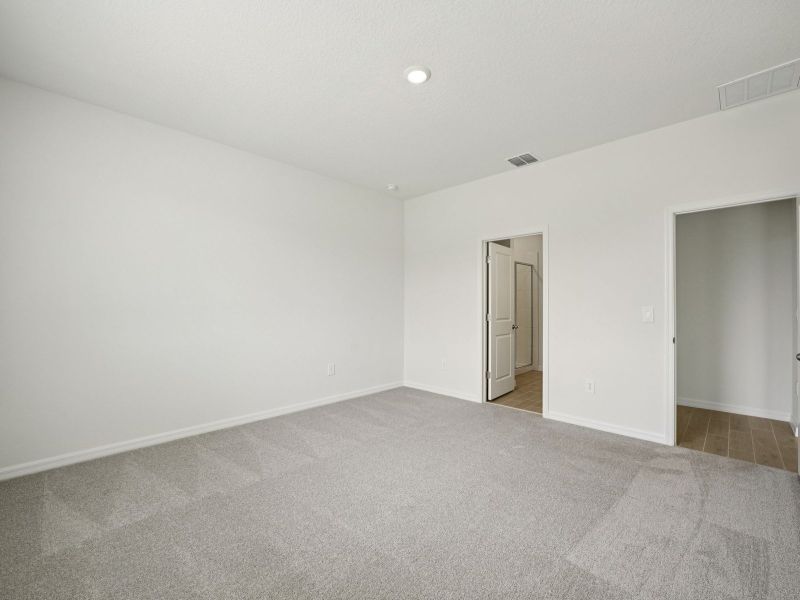 Spacious, unfurnished interior of a new home in Two Rivers - Classic Series, Zephyrhills (Image 13).