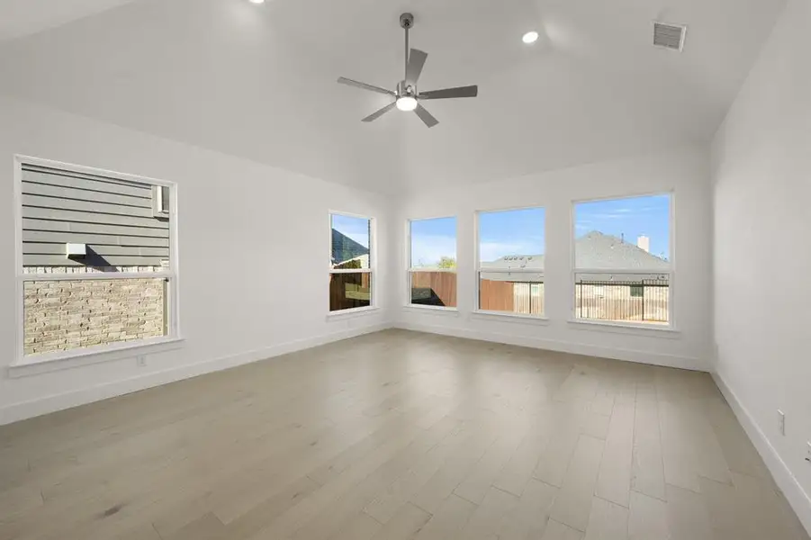 Spacious, unfurnished interior of a new home in High Country, Burleson (Image 26).