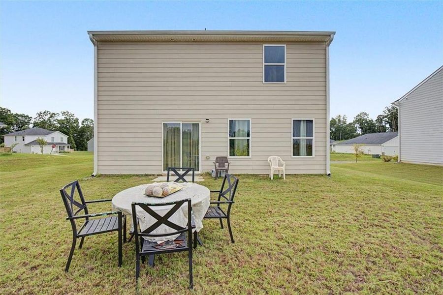 Exterior details and patio area of a home in Kingston Park, Kingston (Image 27).