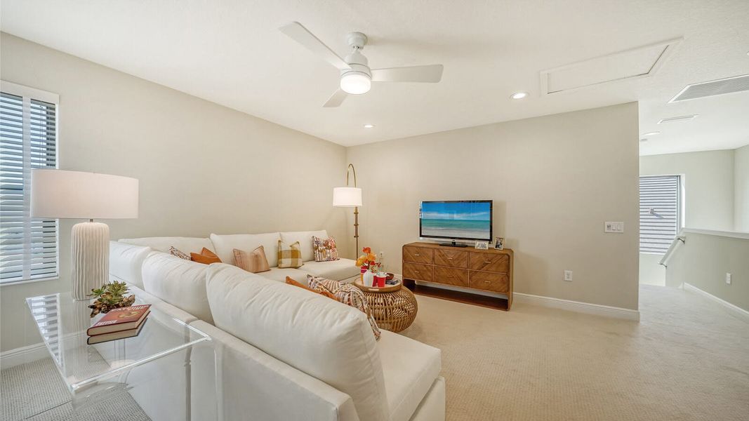 Furnished interior view inside a new home in SkySail Real Estate and Homes for Sale in Naples, FL - Neal Communities, Naples (Image 18).