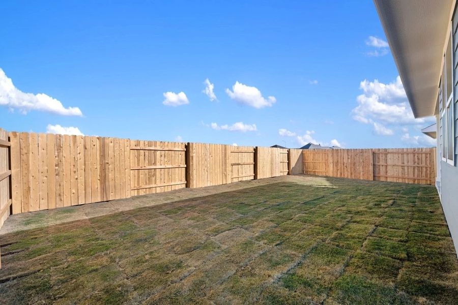 Exterior details and patio area of a home in Lariat, Liberty Hill (Image 26). Exterior details and patio area of a home in Lariat, Liberty Hill (Image 26).