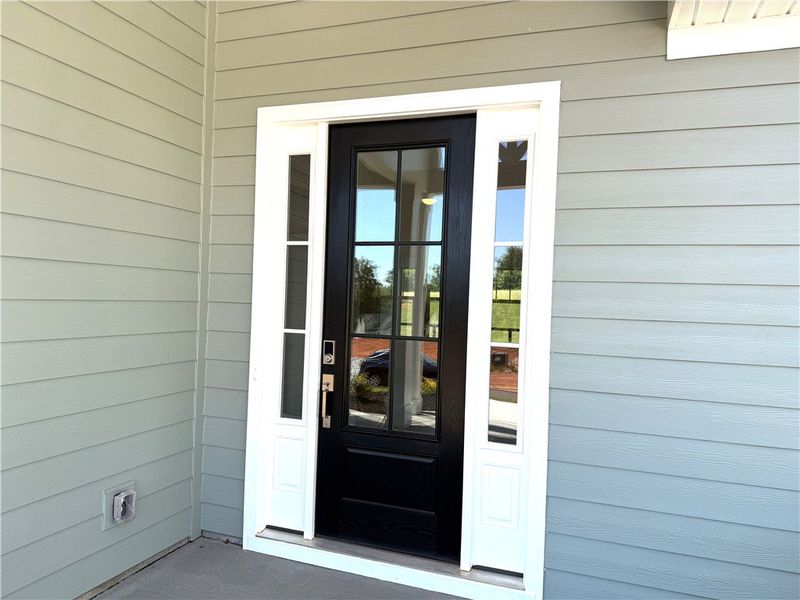 This welcoming front door offers an inviting entra