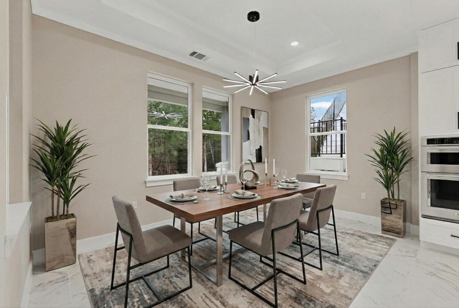 Breakfast area with tile floors, recessed lighting, virtually staged Breakfast area with tile floors, recessed lighting, virtually staged