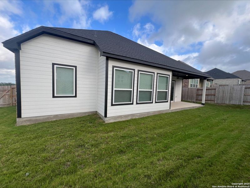 Front exterior of a new home in , Castroville, TX, highlighting curb appeal (Image 16). Front exterior of a new home in , Castroville, TX, highlighting curb appeal (Image 16).