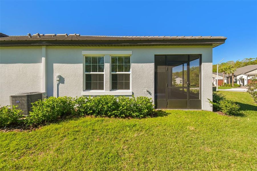 Front exterior of a new home in Angeline Active Adult, Land O' Lakes, FL, highlighting curb appeal (Image 28).