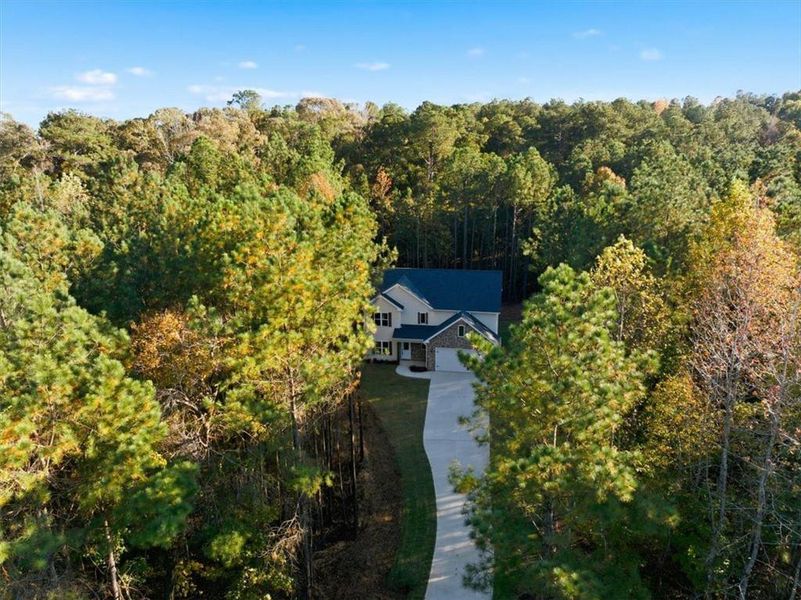 Front exterior of a new home in , Whitesburg, GA, highlighting curb appeal (Image 1).