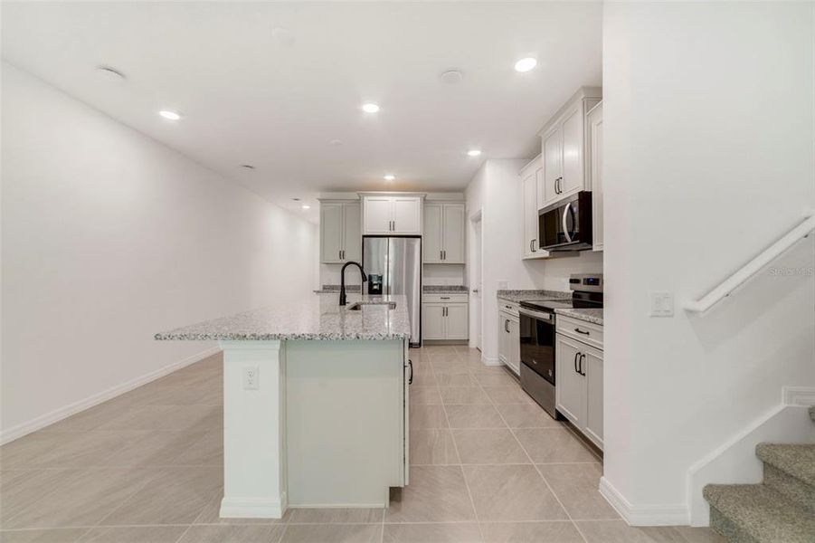 Furnished interior view inside a new home in Towns at Greenleaf, Oviedo (Image 7).