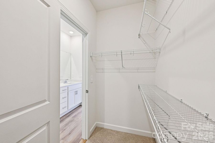 Photo is not of the actual home, but is an inspirational photo of builder’s model home and may depict options, furnishings, and/or decorator features that are not included