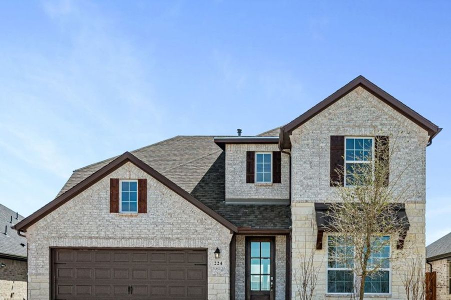 Representative exterior photo of a completed home built from the Salado by UnionMain Homes in Legacy Hills, Celina, TX (Image 28).