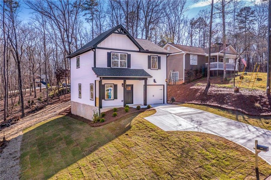 Front exterior of a new home in , Murrayville, GA, highlighting curb appeal (Image 22). Front exterior of a new home in , Murrayville, GA, highlighting curb appeal (Image 22).