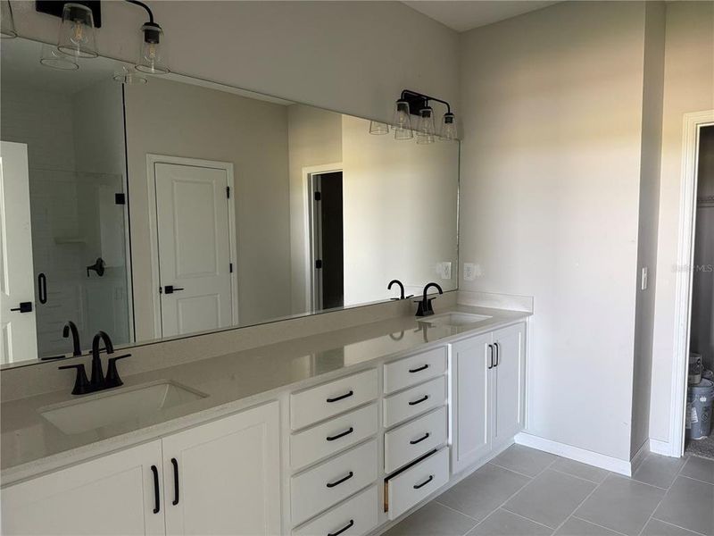 In-progress construction of a new home in Oakfield Trails Traditional, Parrish, FL (Image 25).