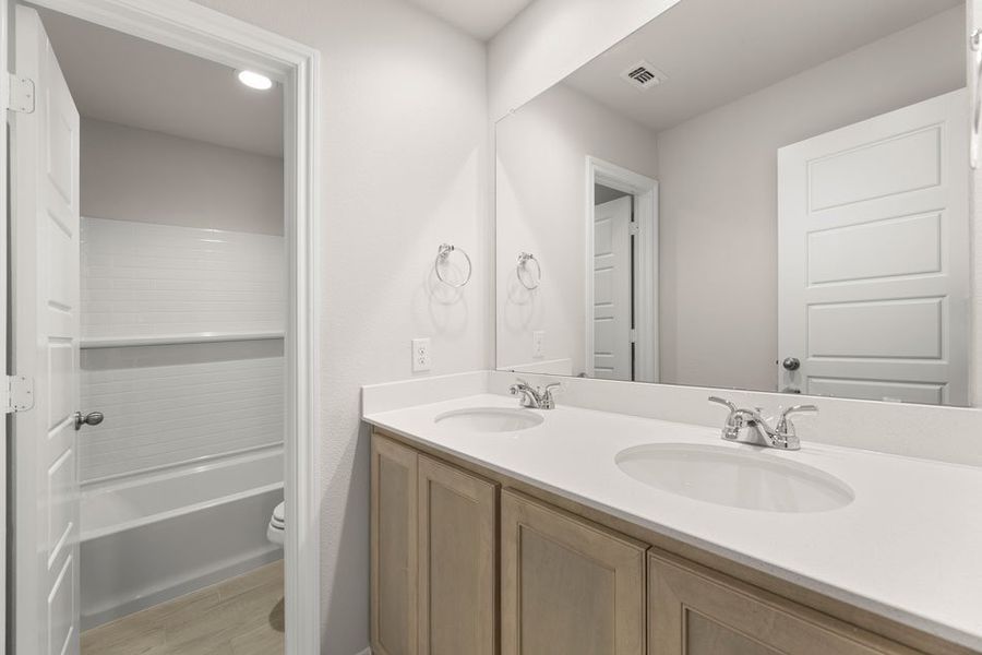 Front exterior of a new home in DeBerry Reserve, Royse City, TX, highlighting curb appeal (Image 9). Front exterior of a new home in DeBerry Reserve, Royse City, TX, highlighting curb appeal (Image 9).