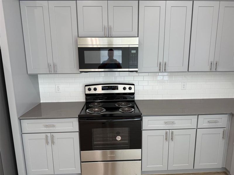 built in micro, subway tile backsplash, cabinet pulls built in micro, subway tile backsplash, cabinet pulls