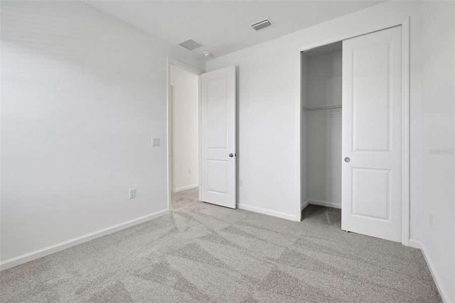 Spacious, unfurnished interior of a new home in Serenade at Ovation, Winter Garden (Image 21).