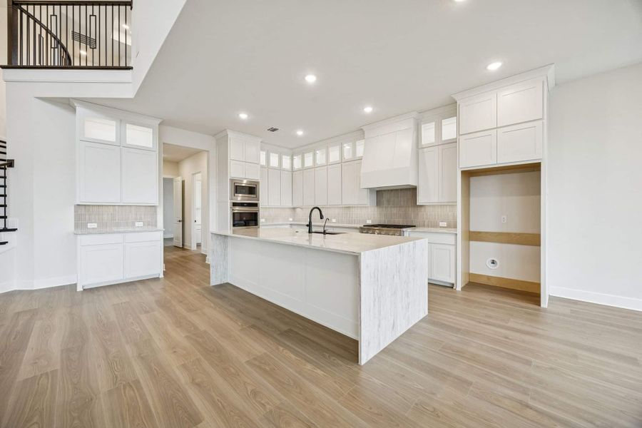 Furnished interior view inside a new home in The Grove Frisco, Frisco (Image 5).