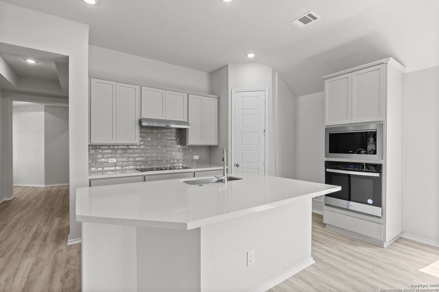 Furnished interior view inside a new home in Megan's Landing, Castroville (Image 9).