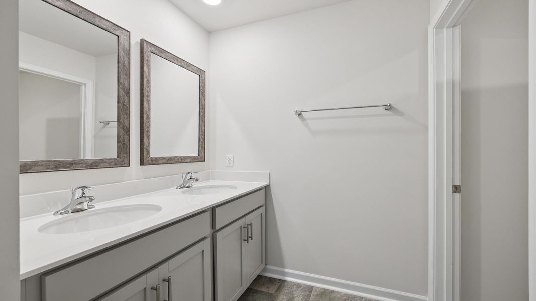 Furnished interior view inside a new home in Lakestone, Woodruff (Image 9).