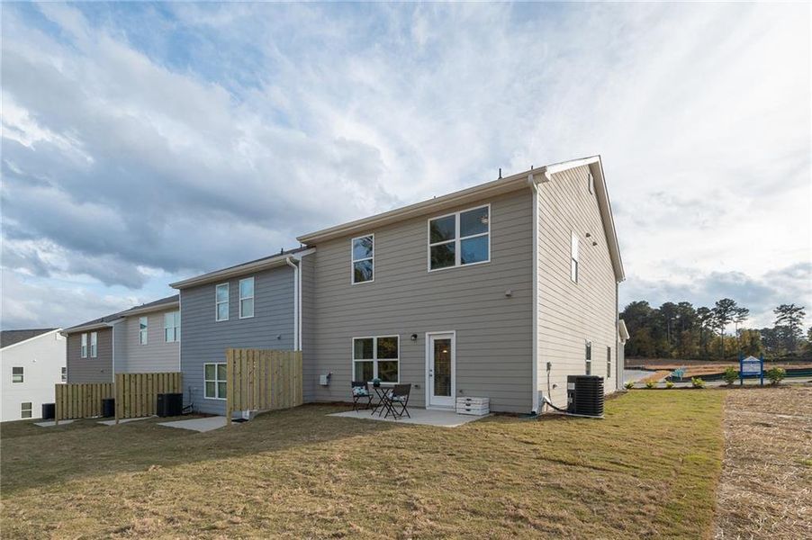 Exterior details and patio area of a home in Creekside Village, Lithonia (Image 4).
