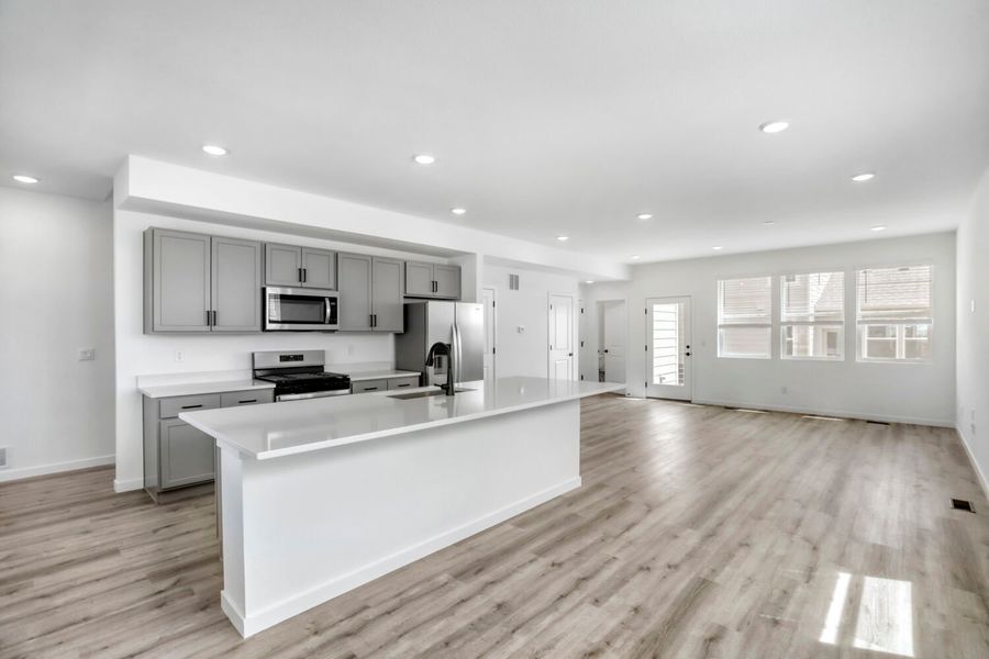 Furnished interior view inside a new home in Barefoot, Firestone (Image 3).