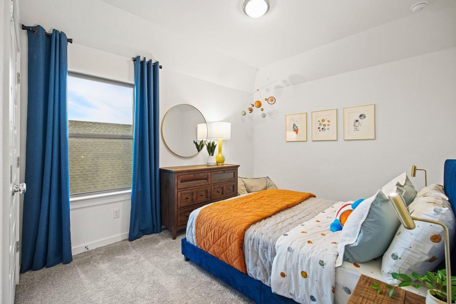 Bedroom in the Oak home plan by Trophy Signature Homes – REPRESENTATIVE PHOTO