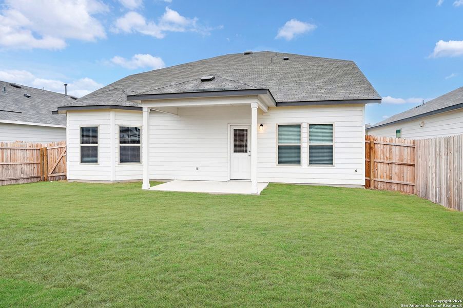 Exterior details and patio area of a home in Winding Brook, San Antonio (Image 22).