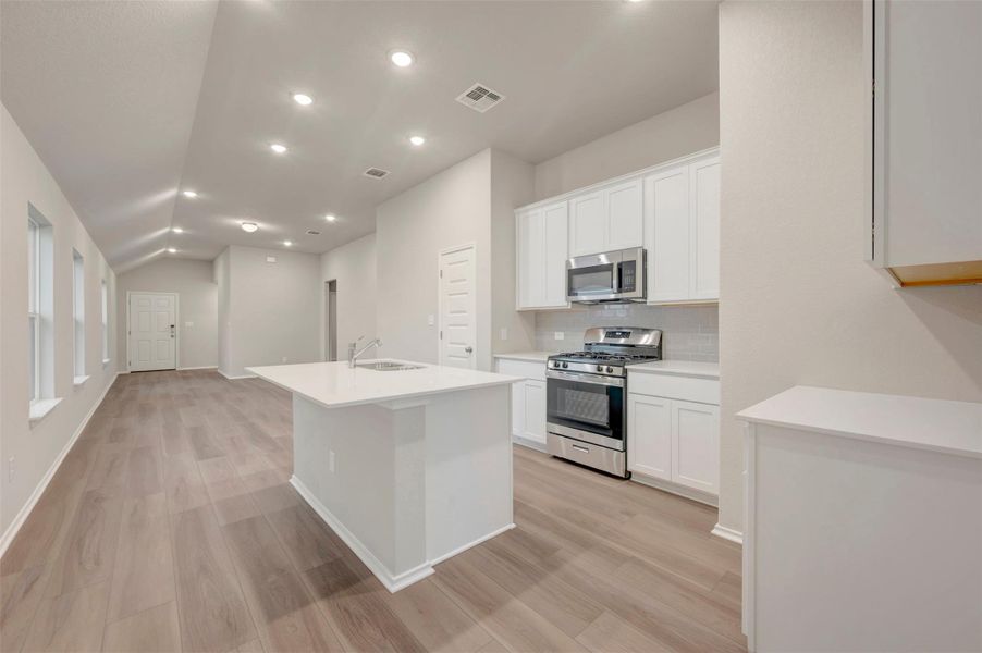 Furnished interior view inside a new home in Heritage, Dripping Springs (Image 7).