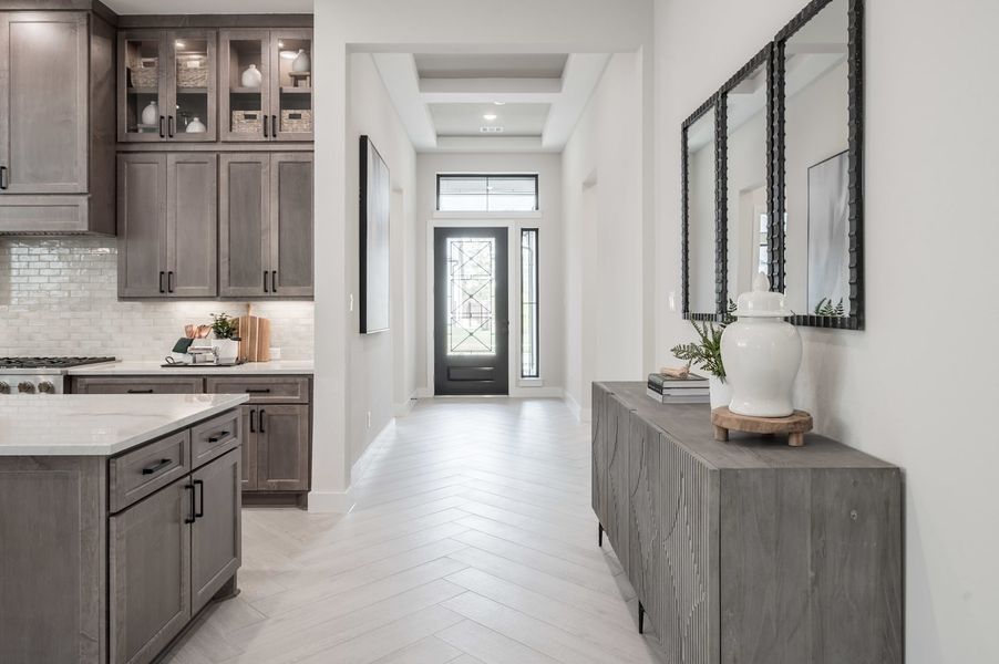 Representative furnished interior of a home built from the Carignan by Tri Pointe Homes in Woodson’s Reserve, Spring (Image 55).