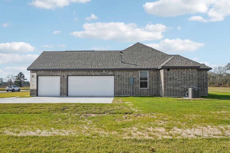 Front exterior of a new home in Barton Place, Cleveland, TX, highlighting curb appeal (Image 1). Front exterior of a new home in Barton Place, Cleveland, TX, highlighting curb appeal (Image 1).