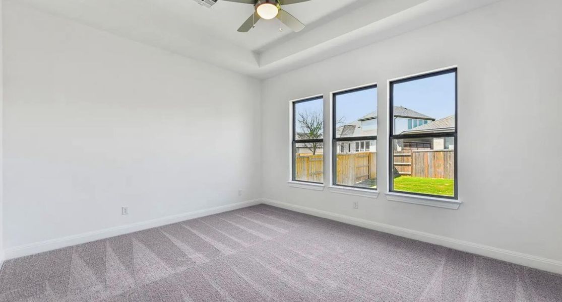 Spacious, unfurnished interior of a new home in 6 Creeks, Kyle (Image 11).