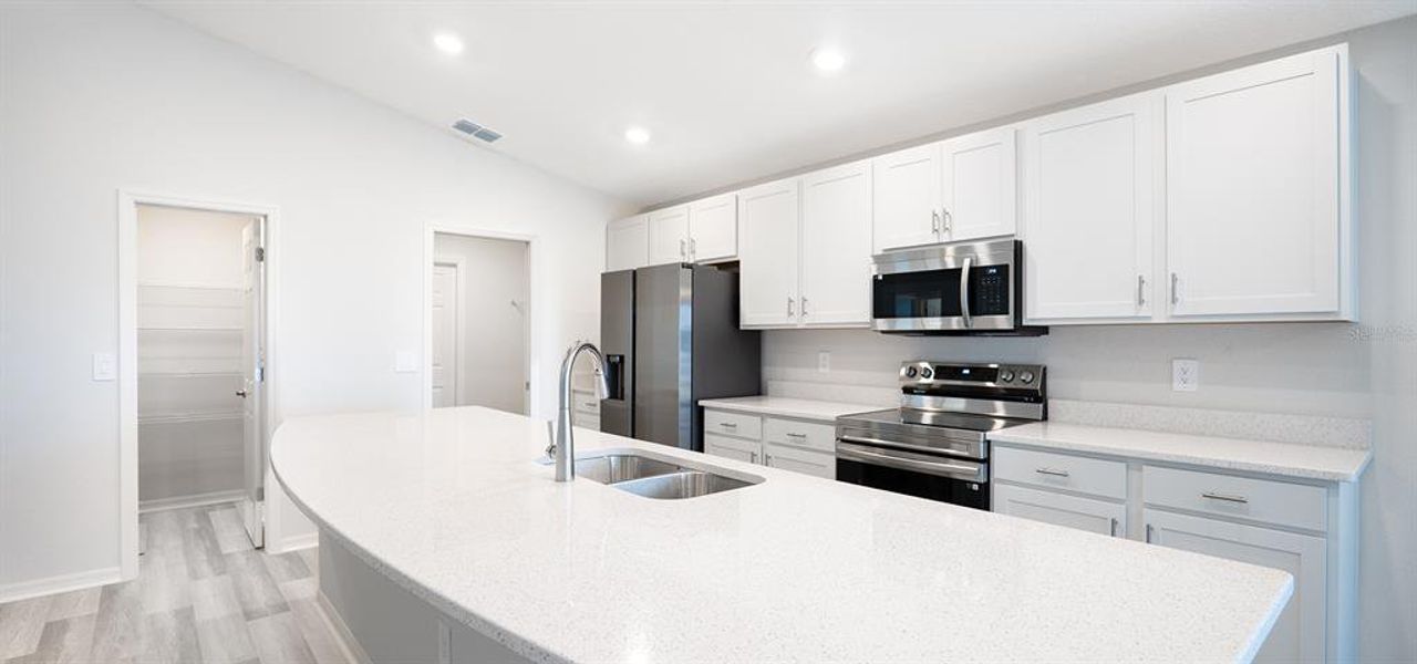 Furnished interior view inside a new home in Summerlake Estates, Auburndale (Image 4).