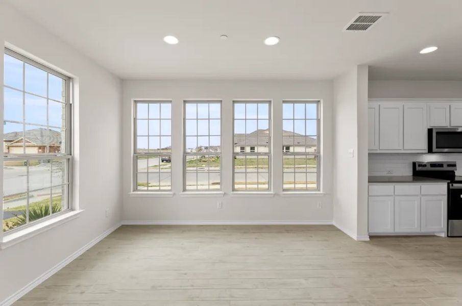 Front exterior of a new home in Sanger Circle, Sanger, TX, highlighting curb appeal (Image 7).