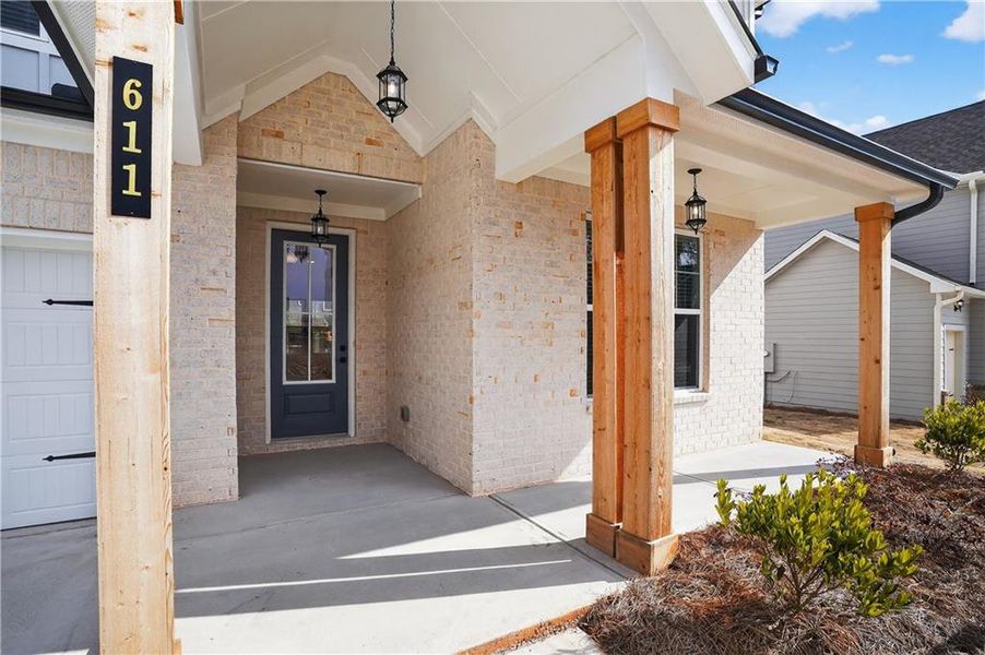 Exterior details and patio area of a home in The Fairways at Mirror Lake, Villa Rica (Image 3).