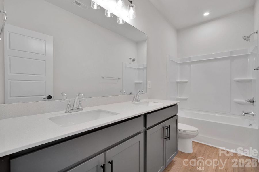 Furnished interior view inside a new home in Trellis at The Commons, Charlotte (Image 9). Furnished interior view inside a new home in Trellis at The Commons, Charlotte (Image 9).